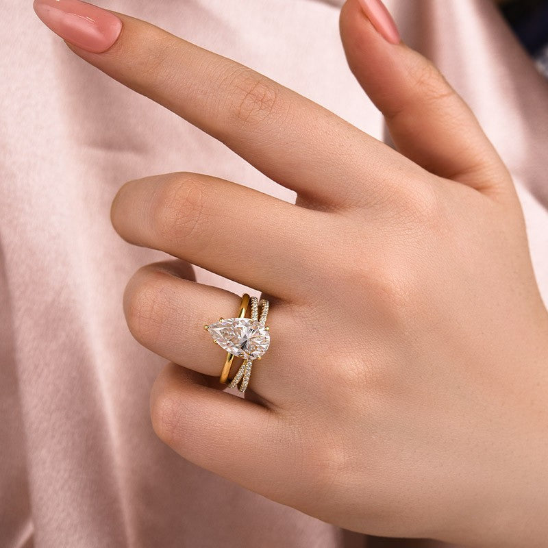 Moissanite 4.0 Ct Pear Cut Yellow Gold Wedding Ring With X Criss Cross Wedding Band