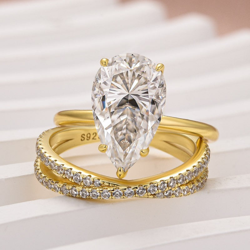 Moissanite 4.0 Ct Pear Cut Yellow Gold Wedding Ring With X Criss Cross Wedding Band