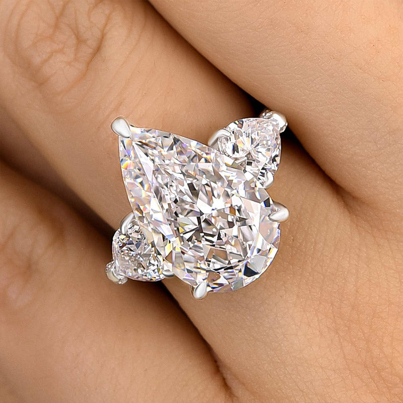 Stunning Pear Cut Three Stone Engagement Ring