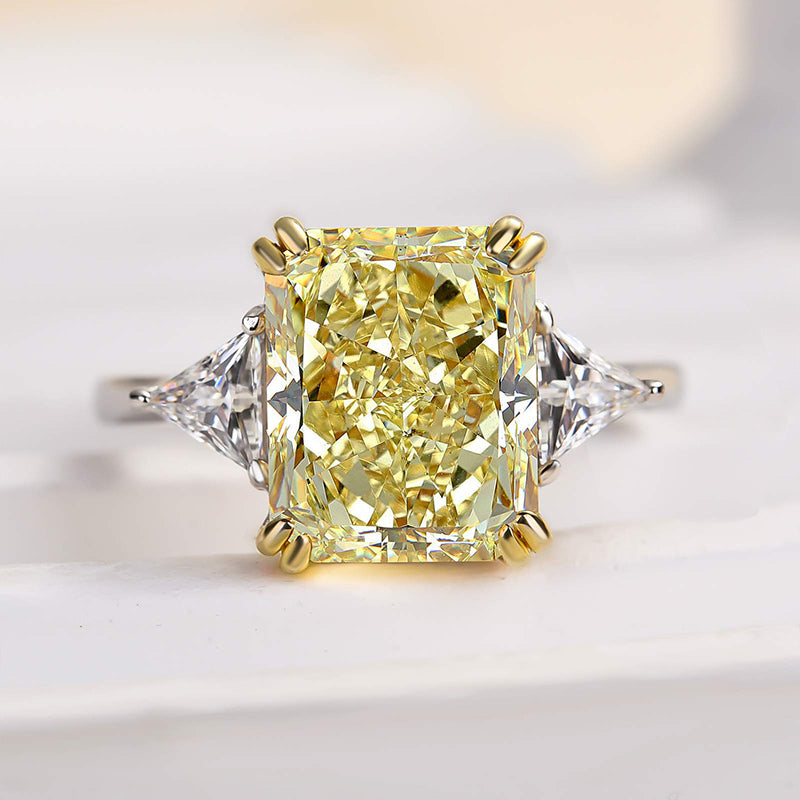 Radiant Cut Yellow Stone Two-Tone Engagement Ring With Triangle Cut Side-stones