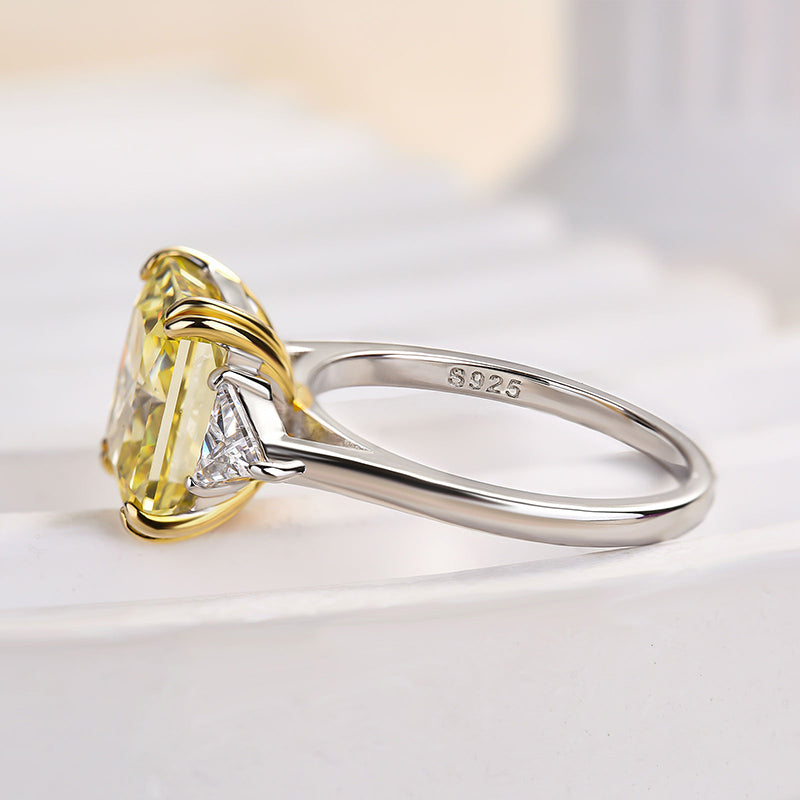 Radiant Cut Yellow Stone Two-Tone Engagement Ring With Triangle Cut Side-stones