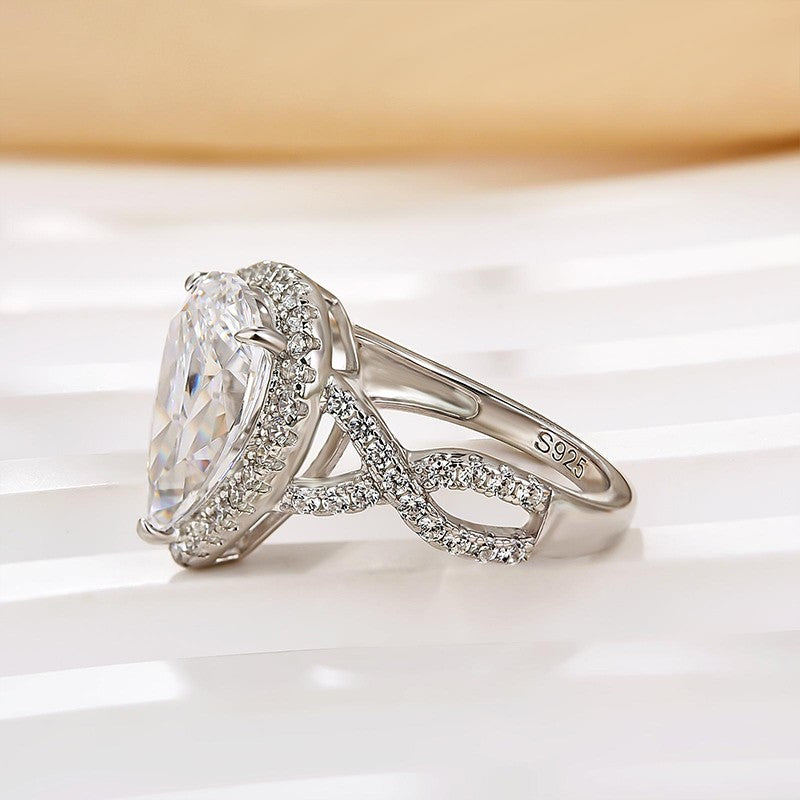 4.0Ct Halo Pear Cut Twist Travel Ring In Sterling Silver