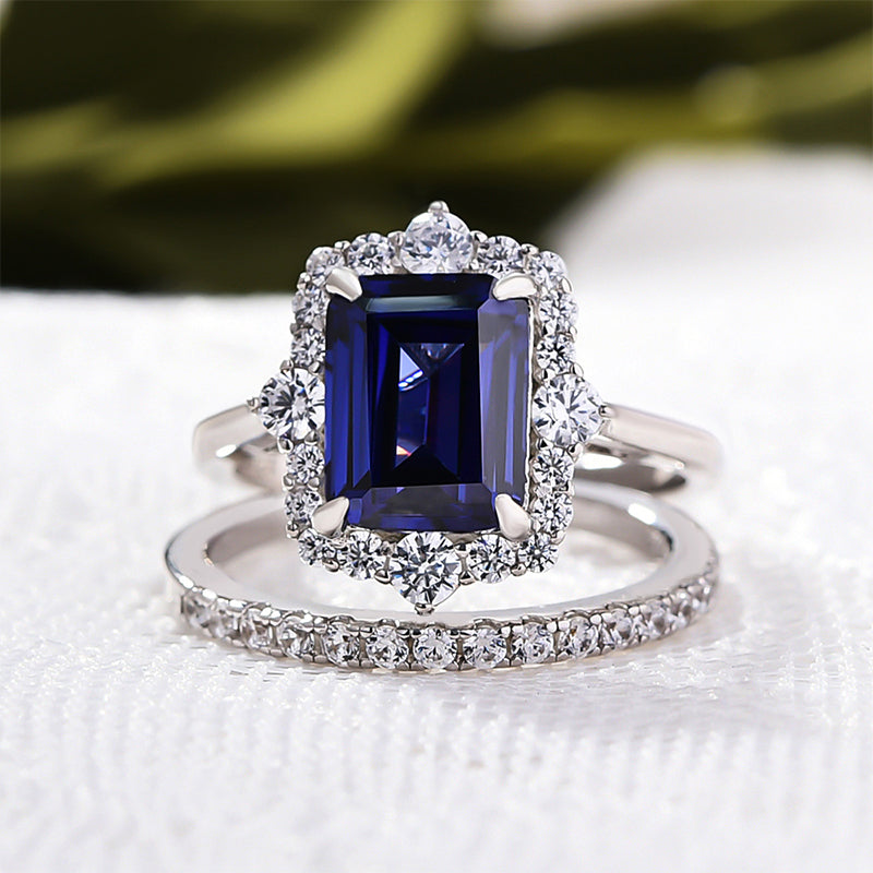 Exclusive Halo Blue Sapphire Emerald Cut Wedding Ring Sets In Sterling Silver