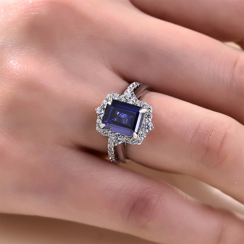 Exclusive Halo Blue Sapphire Emerald Cut Wedding Ring Sets In Sterling Silver