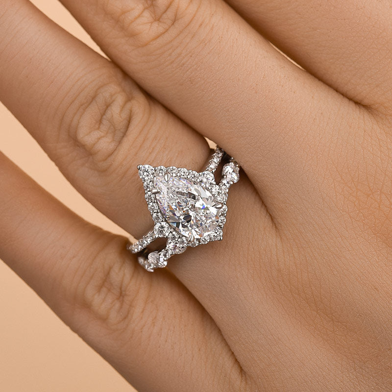 Lovely Halo Pear Cut Bridal Ring Set In Sterling Silver