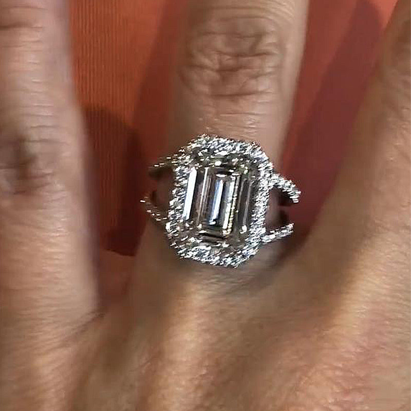 Noble Split Shank Halo Emerald Cut Engagement Ring In Sterling Silver