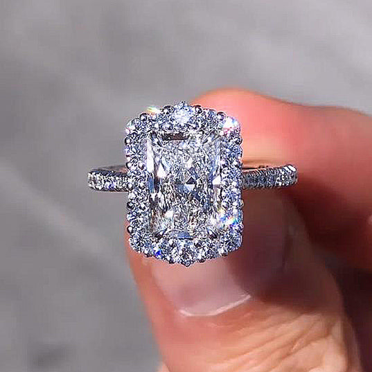 Temperamental Halo Radiant Cut Simulated Diamond Engagement Ring