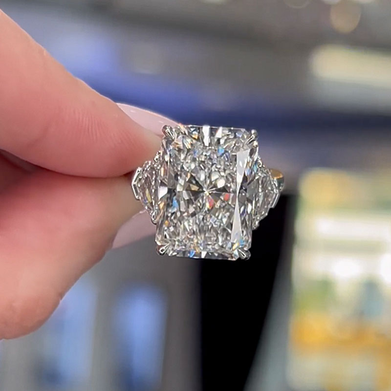 Honorable Crushed Ice Radiant Cut Three Stone Engagement Ring In Sterling Silver
