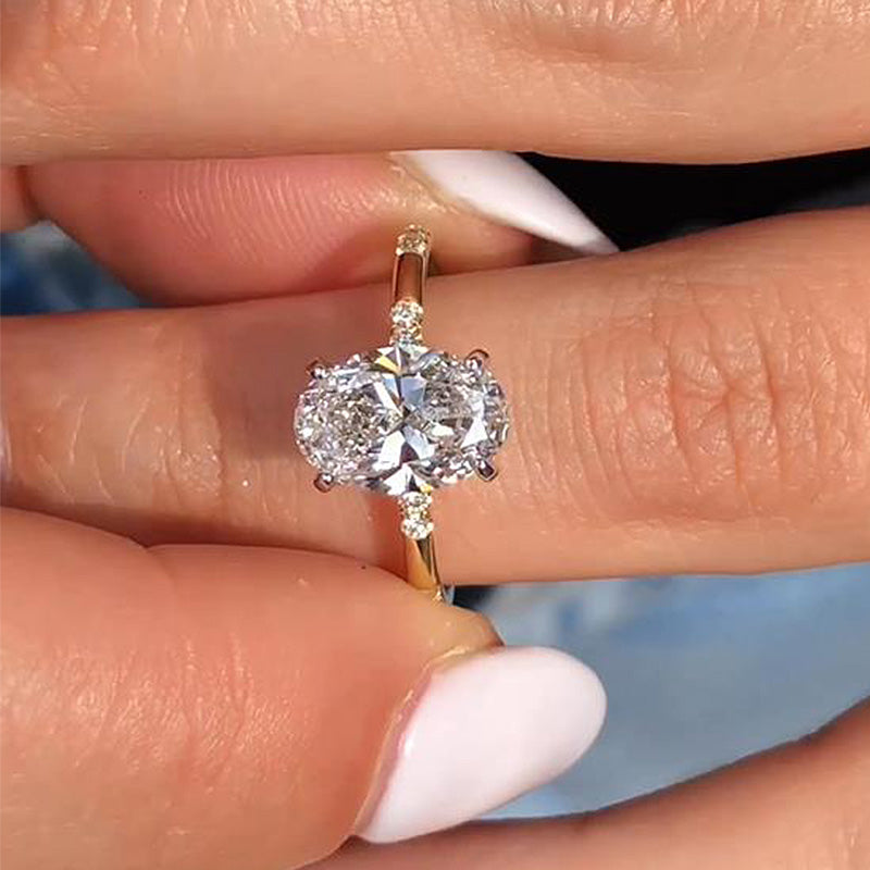 Lovely Yellow Gold Oval Cut Engagement Ring In Sterling Silver