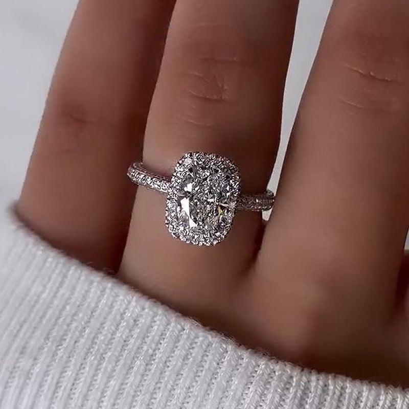 Unique Halo Oval Cut Sona Simulated Diamond Engagement Ring
