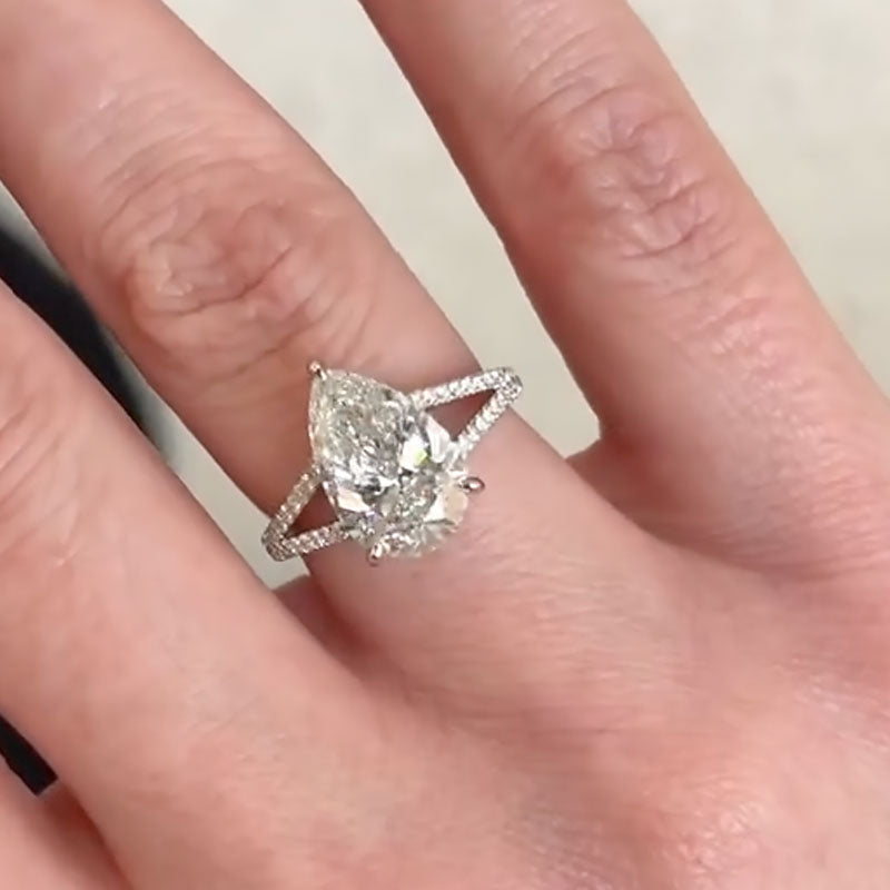 Maxine Unique Split Shank Pear Cut Engagement Ring In Sterling Silver