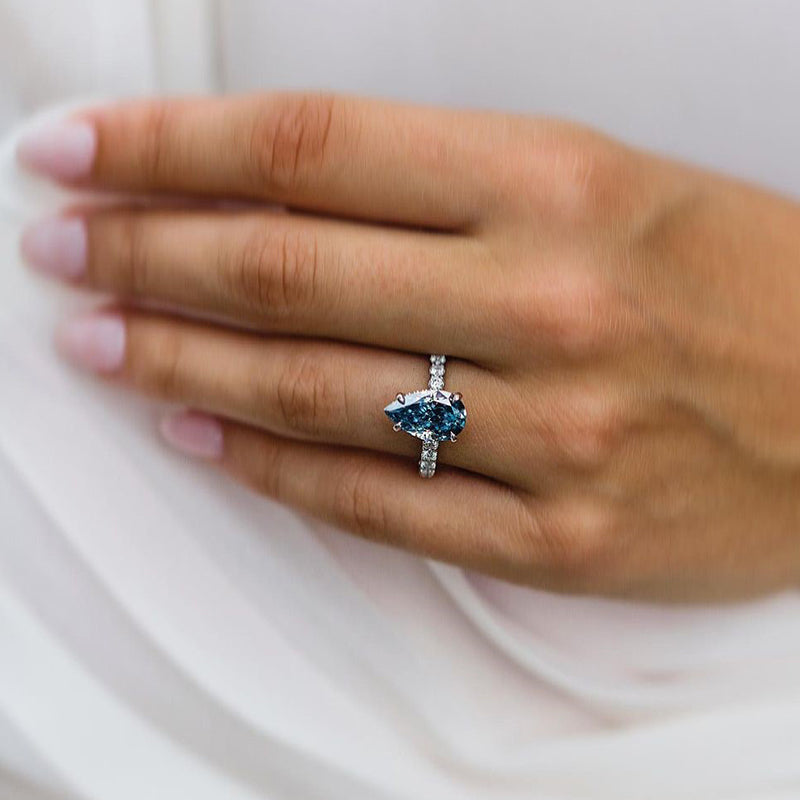 Unique Pear Cut Blue Sapphire Engagement Ring In Sterling Silver
