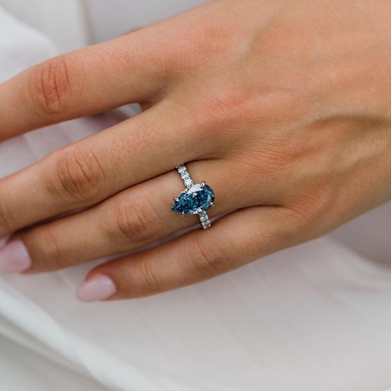 Unique Pear Cut Blue Sapphire Engagement Ring In Sterling Silver
