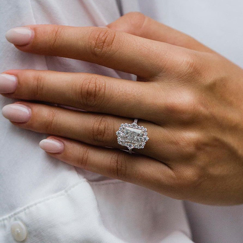 Gorgeous Halo Radiant Cut Simulated Diamond Engagement Ring In Sterling Silver
