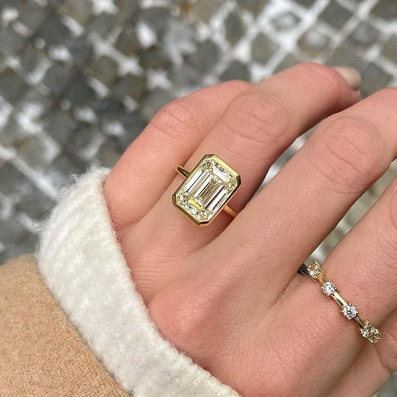 Unique Yellow Gold Emerald Cut Bezel Engagement Ring In Sterling Silver