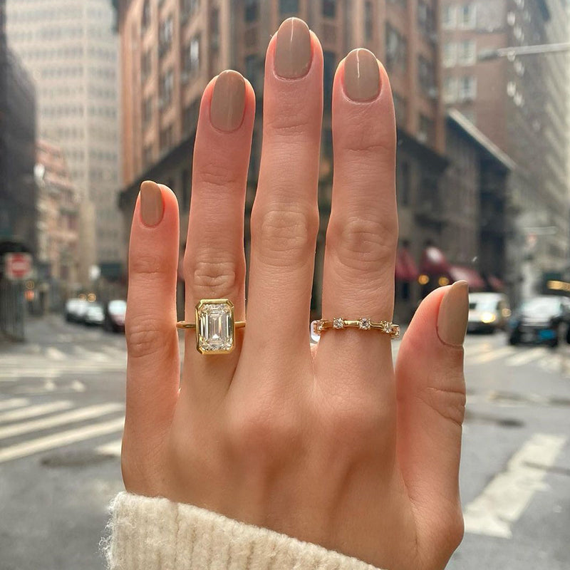 Unique Yellow Gold Emerald Cut Bezel Engagement Ring In Sterling Silver