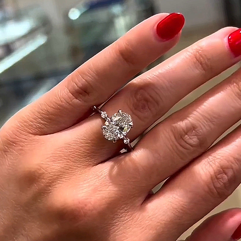 Elegant Oval Cut Engagement Ring In Sterling Silver