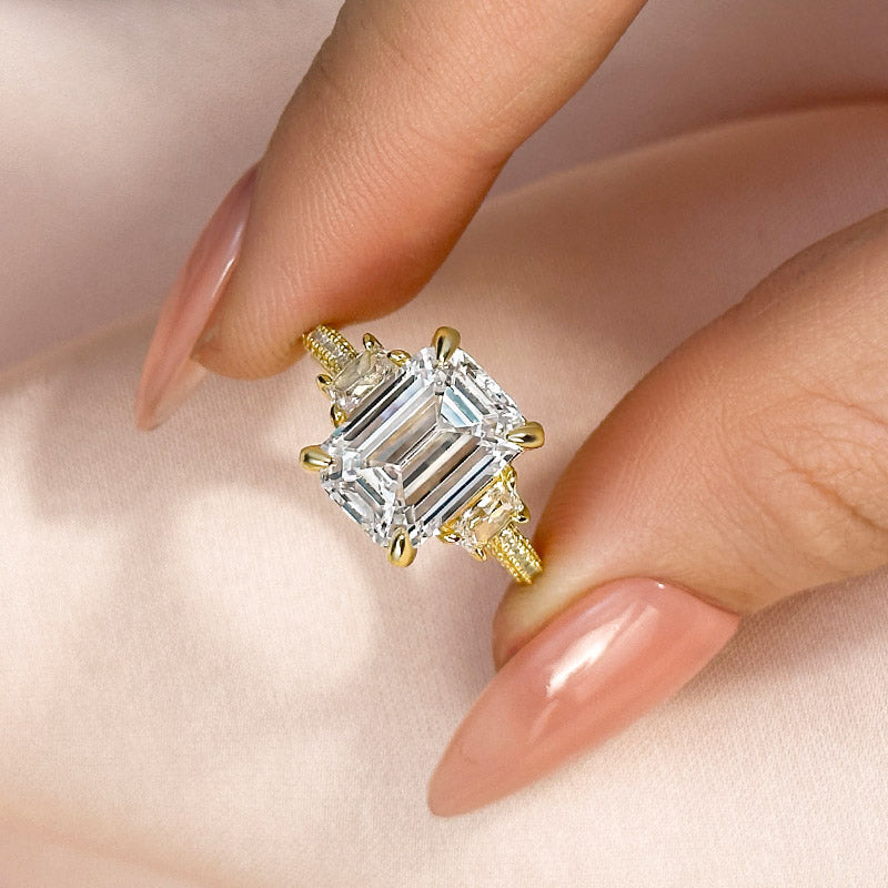Maxine Stunning Emerald Cut Three Stone Engagement Ring In Sterling Silver