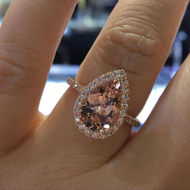3.0 Carat Halo Pear Cut Synthetic Morganite Engagement Ring In Sterling Silver