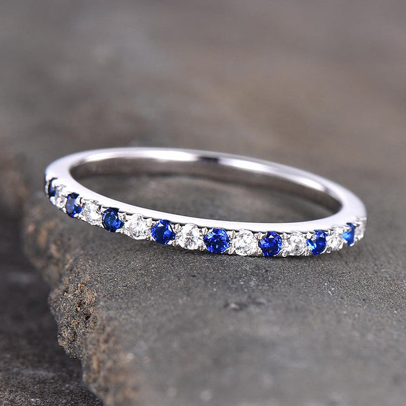 Half Eternity Blue And White Sapphire Wedding Band For Women In Sterling Silver