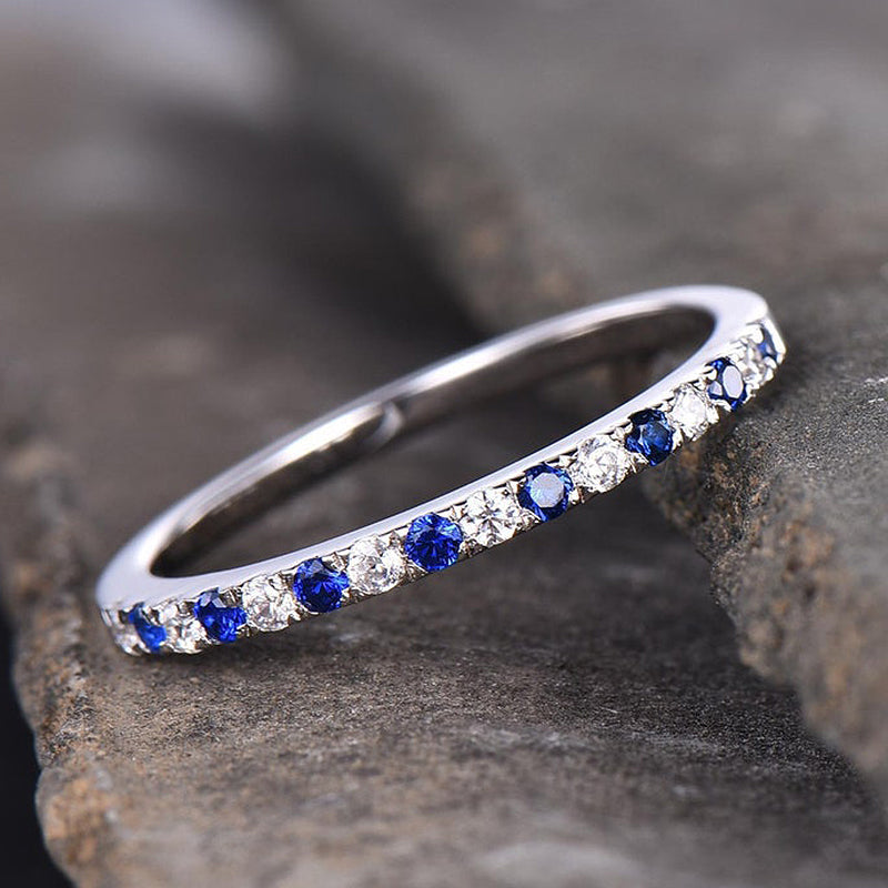 Half Eternity Blue And White Sapphire Wedding Band For Women In Sterling Silver