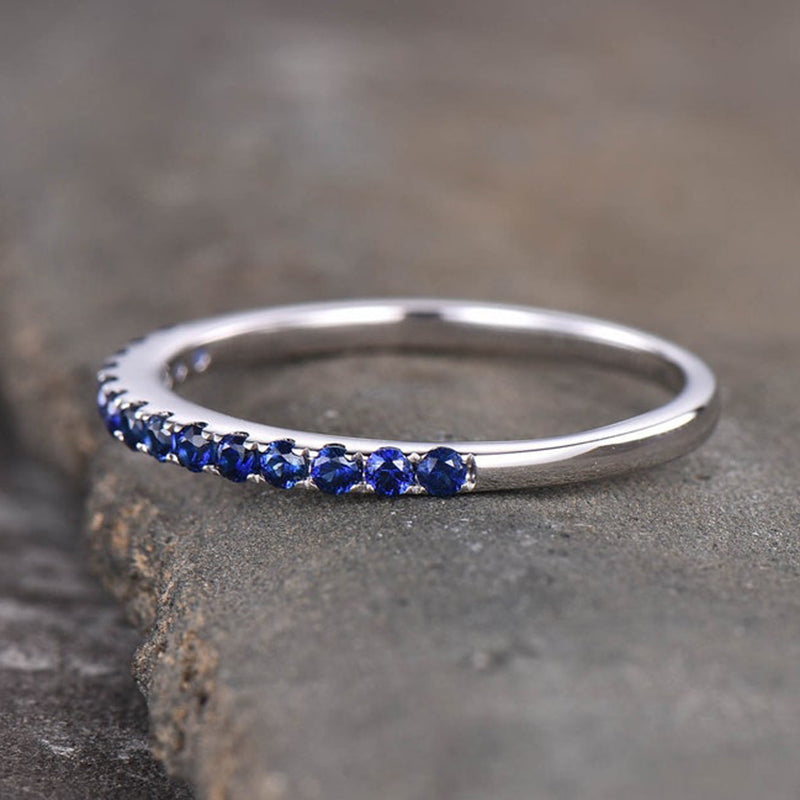 Exquisite Half Eternity Blue Sapphire Women's Wedding Band In Sterling Silver