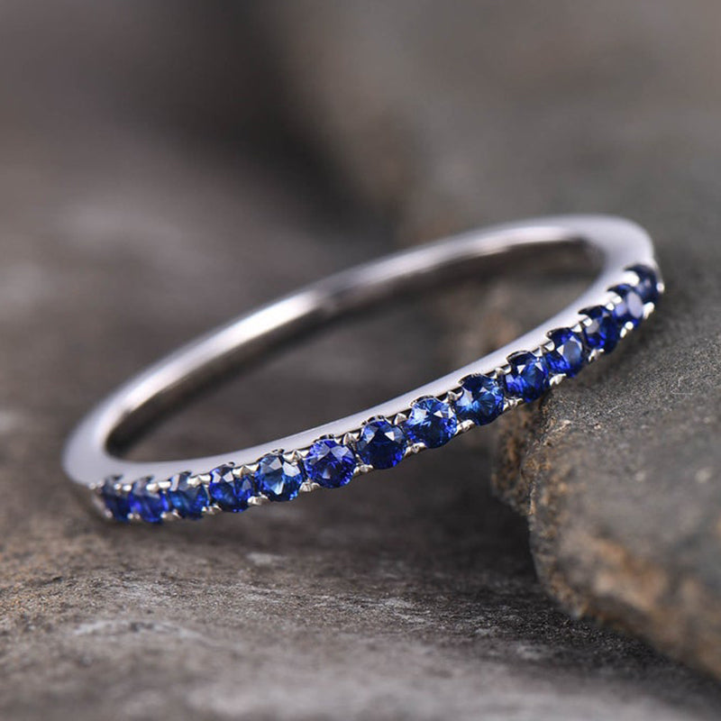 Exquisite Half Eternity Blue Sapphire Women's Wedding Band In Sterling Silver