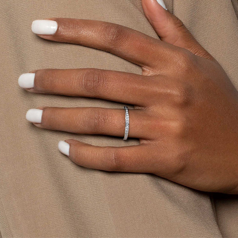 Exclusive Channel Set Curved Half Wedding Band In Sterling Silver