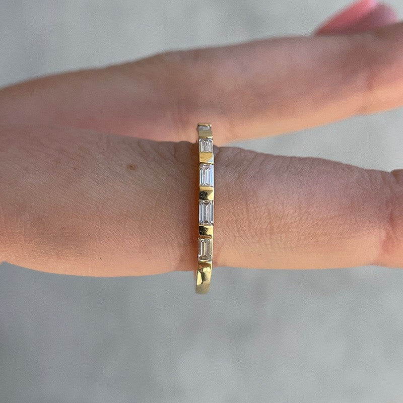Noble Emerald Cut Yellow Gold Half Wedding Band In Sterling Silver